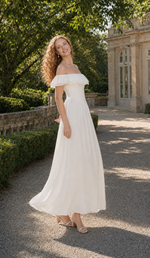 Side view of A Minuet at Versailles Dress with a layered ruffle neckline and flowing ankle-length skirt.