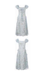 Front and back views of the Echoes of Tsingtao Bay Dress on white, featuring a chiffon bow and flutter sleeves.