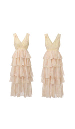 Front and back view of the Lilies Before Sunset Dress displaying the deep V-neckline, floral chiffon fabric, tiered maxi skirt, and elegant flowing silhouette.
