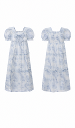 Front and back views of The Blue Rose of Avignon Dress with a chest bow, puff sleeves and blue rose print.