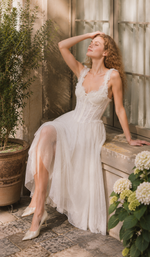 Elegant bridal-inspired styling of the The Forgotten Bride Corset featuring intricate white floral lace, sculpted corset construction, and romantic feminine details.