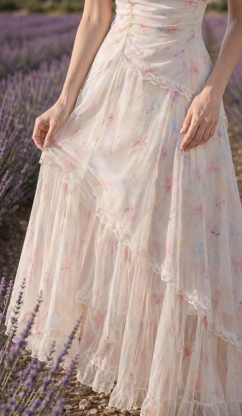 Close-up of the asymmetric lace-trimmed chiffon skirt on The Lavender Promise Dress
