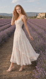 Three-quarter view of The Lavender Promise Dress with pastel florals and lace-trimmed layers