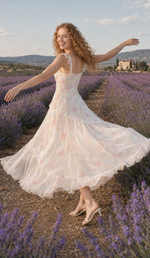 Back view of The Lavender Promise Dress twirling in a Provence lavender field