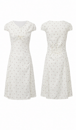 Front and back product view of The Rosekeeper of Gordes Dress with an ivory floral print and lace-up waist.