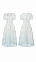 Front and back view of the The Sixth Summer Corset Dress showcasing the lace neckline, fitted corset bodice, short puff sleeves, and flowing blue chiffon skirt.
