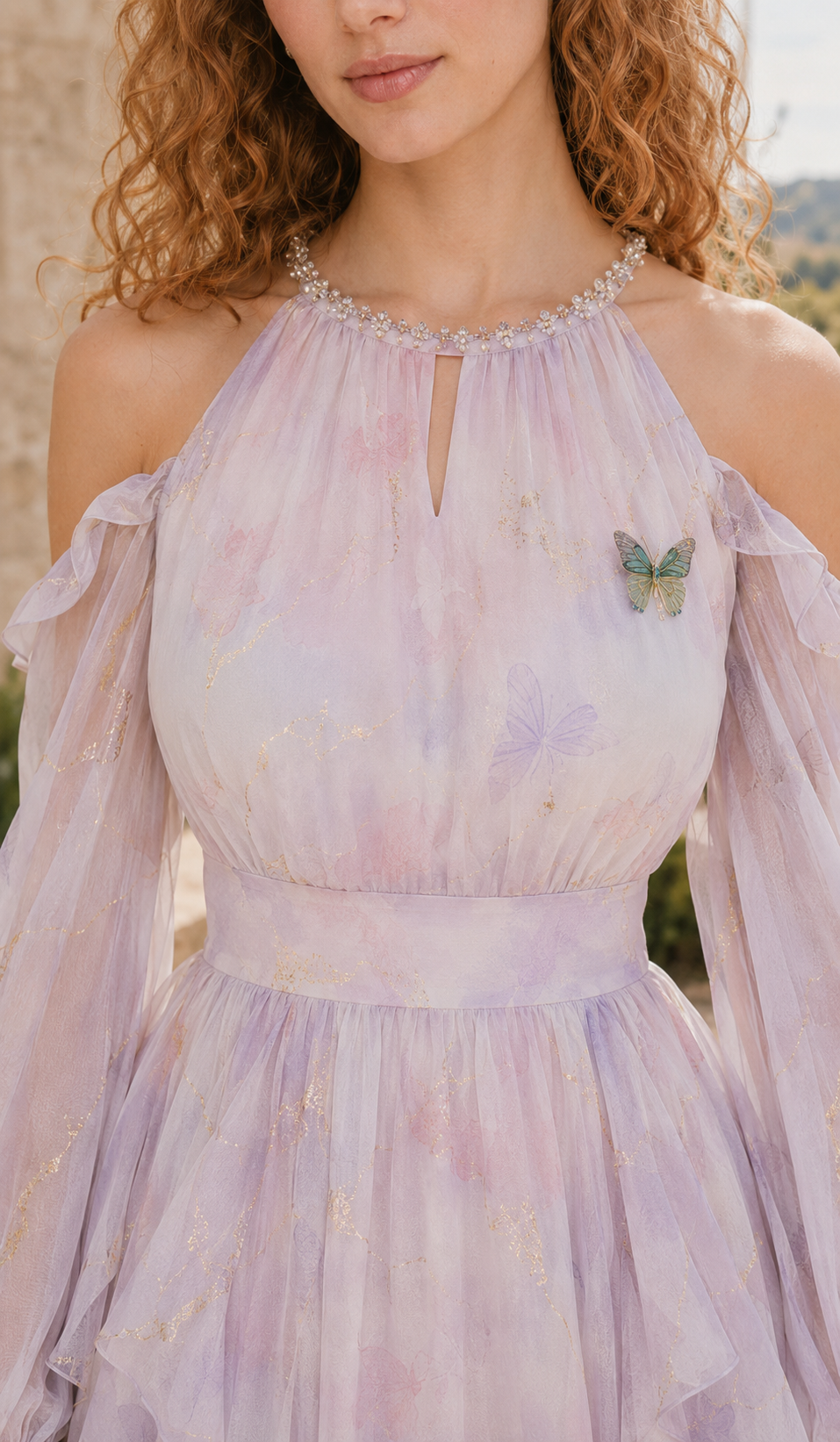 Close-up of the Violette Butterfly Dress beaded neckline, keyhole bodice and butterfly embellishment