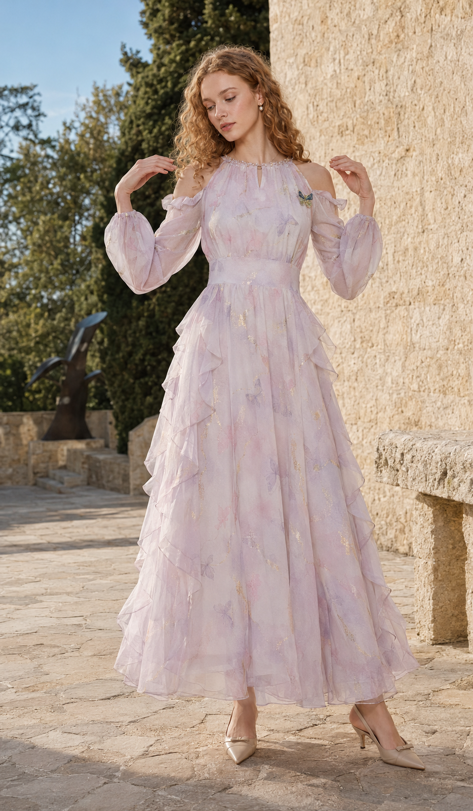 Model twirling in the Violette Butterfly Dress with layered ruffles and metallic gold accents